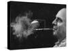 President of Zeus Corp., Robert Stern, Smoking from Self-Designed "Rainy Day" Cigarette Holder-Yale Joel-Stretched Canvas
