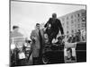 Presidential Candidate John F. Kennedy Leaping from His Car While Campaigning-Paul Schutzer-Mounted Photographic Print