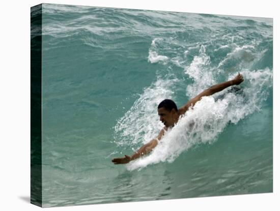 Presidential Candidate Senator Barack Obama, On Vacation, Body Surfing at a Beach, Honolulu, Hawaii-null-Stretched Canvas