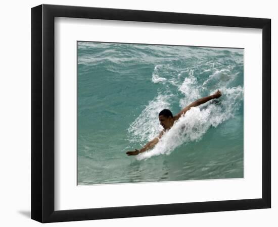 Presidential Candidate Senator Barack Obama, On Vacation, Body Surfing at a Beach, Honolulu, Hawaii-null-Framed Photographic Print