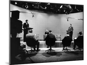 Presidential Candidates Senator John Kennedy and Rep. Richard Nixon Standing at Lecterns Debating-Francis Miller-Mounted Photographic Print