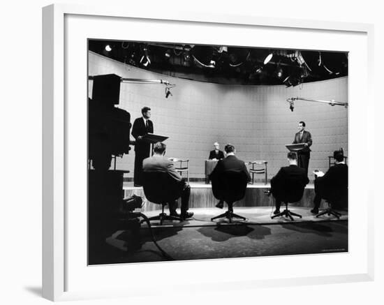 Presidential Candidates Senator John Kennedy and Rep. Richard Nixon Standing at Lecterns Debating-Francis Miller-Framed Photographic Print