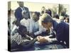 Presidential Contender Bobby Kennedy Stops During Campaigning to Shake Hands African American Boy-Bill Eppridge-Stretched Canvas