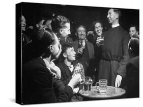 Priest Drinking in a Pub During a Revival of the Church of England-null-Stretched Canvas