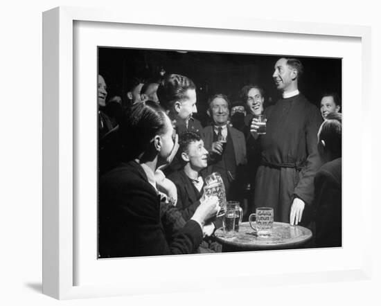 Priest Drinking in a Pub During a Revival of the Church of England-null-Framed Photographic Print