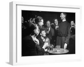 Priest Drinking in a Pub During a Revival of the Church of England-null-Framed Photographic Print