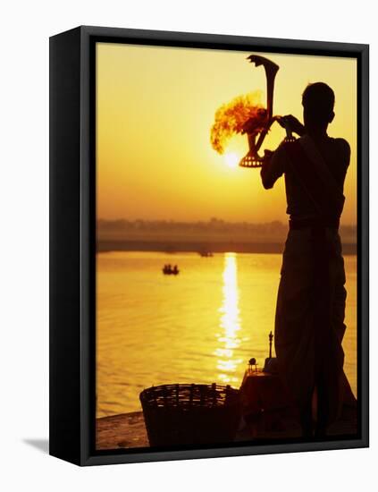 Priest Moves Lantern in Front of Sun During Morning Puja on Ganga Ma, Varanasi, India-Anthony Plummer-Framed Stretched Canvas