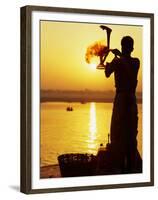 Priest Moves Lantern in Front of Sun During Morning Puja on Ganga Ma, Varanasi, India-Anthony Plummer-Framed Premium Photographic Print