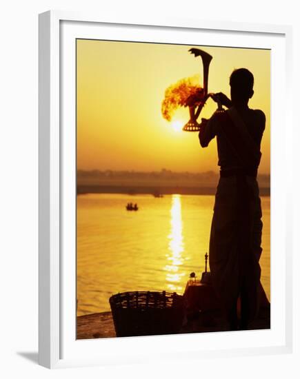 Priest Moves Lantern in Front of Sun During Morning Puja on Ganga Ma, Varanasi, India-Anthony Plummer-Framed Premium Photographic Print