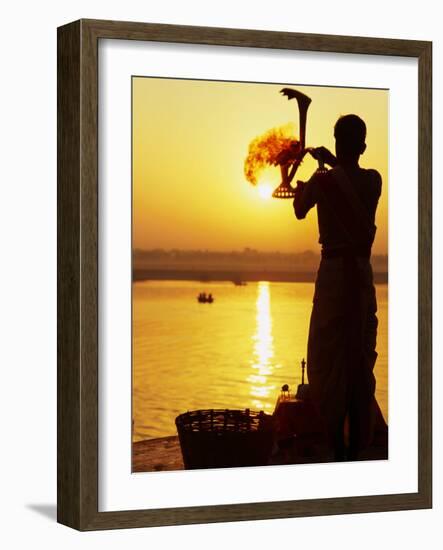 Priest Moves Lantern in Front of Sun During Morning Puja on Ganga Ma, Varanasi, India-Anthony Plummer-Framed Photographic Print