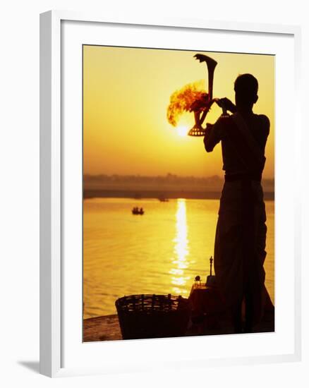 Priest Moves Lantern in Front of Sun During Morning Puja on Ganga Ma, Varanasi, India-Anthony Plummer-Framed Photographic Print