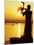 Priest Moves Lantern in Front of Sun During Morning Puja on Ganga Ma, Varanasi, India-Anthony Plummer-Mounted Photographic Print