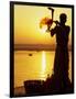 Priest Moves Lantern in Front of Sun During Morning Puja on Ganga Ma, Varanasi, India-Anthony Plummer-Framed Photographic Print