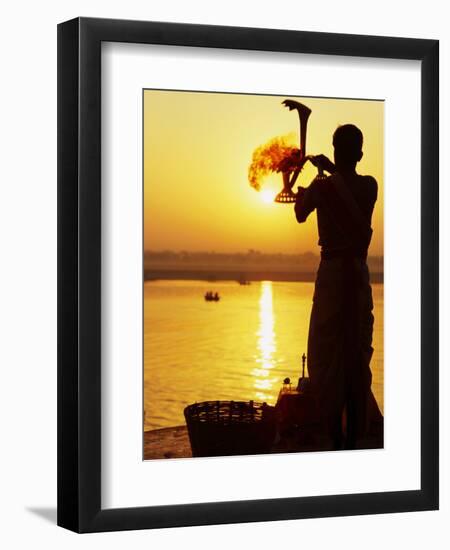 Priest Moves Lantern in Front of Sun During Morning Puja on Ganga Ma, Varanasi, India-Anthony Plummer-Framed Premium Photographic Print