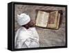 Priest of Ethiopian Orthodox Church Reads Old Bible at Rock-Hewn Church of Yohannes Maequddi-Nigel Pavitt-Framed Stretched Canvas