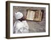 Priest of Ethiopian Orthodox Church Reads Old Bible at Rock-Hewn Church of Yohannes Maequddi-Nigel Pavitt-Framed Photographic Print