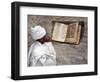 Priest of Ethiopian Orthodox Church Reads Old Bible at Rock-Hewn Church of Yohannes Maequddi-Nigel Pavitt-Framed Photographic Print