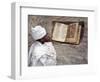 Priest of Ethiopian Orthodox Church Reads Old Bible at Rock-Hewn Church of Yohannes Maequddi-Nigel Pavitt-Framed Photographic Print