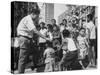 Prime Minister Kuan Yew Lee Talking to Children While Visiting a Housing Project-null-Stretched Canvas