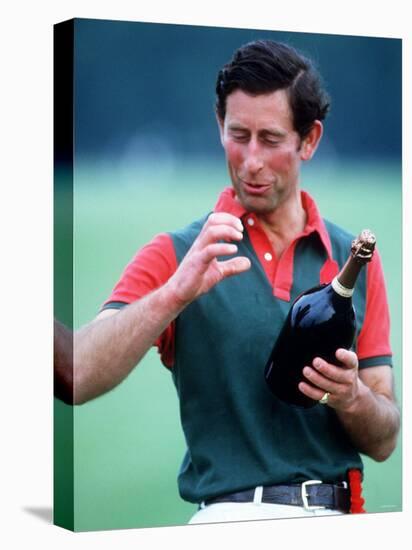 Prince Charles at Polo at Windsor Holding a Bottle of Champange May 1985-null-Stretched Canvas