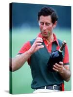 Prince Charles at Polo at Windsor Holding a Bottle of Champange May 1985-null-Stretched Canvas