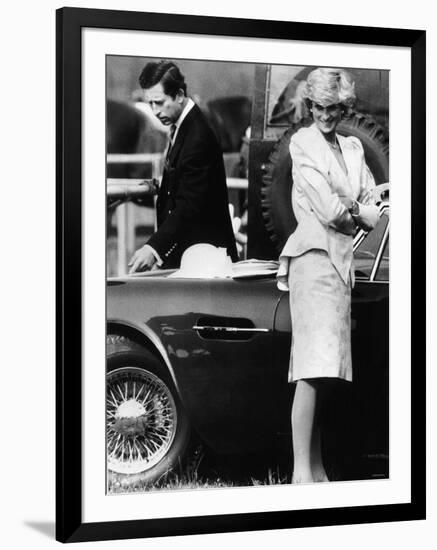 Prince Charles Examining the Bodywork of His Aston Martin-null-Framed Photographic Print