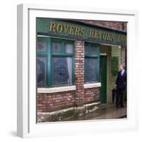 Prince Charles Shelters from the Rain on the Set of "The Soap Coronation Street"-null-Framed Photographic Print