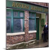 Prince Charles Shelters from the Rain on the Set of "The Soap Coronation Street"-null-Mounted Photographic Print