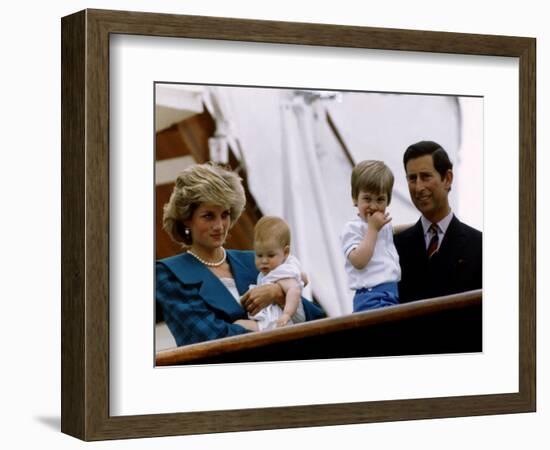 Prince Charles stands holding sons Prince William and Prince Harry with Princess Diana, Circa 1985-null-Framed Photographic Print