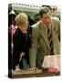Prince Charles with Son Prince Harry Leaving Hand Prints in Concrete During Tour in South Africa-null-Stretched Canvas