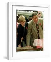 Prince Charles with Son Prince Harry Leaving Hand Prints in Concrete During Tour in South Africa-null-Framed Photographic Print