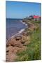 Prince Edward Island, Prim Point Shore and Waves with Red Roof House in Summer with Wildflowers-Bill Bachmann-Mounted Photographic Print