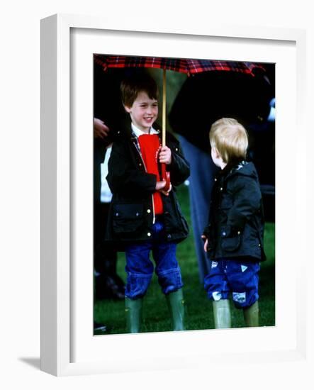Prince Harry on right with Prince William at a polo match in Cirencester-null-Framed Photographic Print