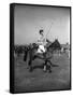 Prince Philips Rides Along on Horseback Holding Polo Stick During Game-null-Framed Stretched Canvas