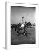 Prince Philips Rides Along on Horseback Holding Polo Stick During Game-null-Framed Photographic Print