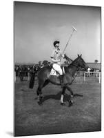 Prince Philips Rides Along on Horseback Holding Polo Stick During Game-null-Mounted Photographic Print