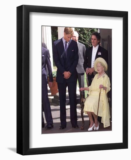 Prince William bends down to talk to The Queen Mother outside Clarence House where she was celebrat-null-Framed Premium Photographic Print