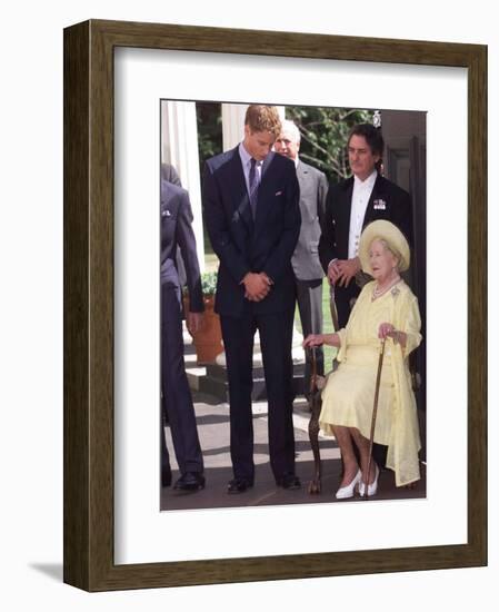 Prince William bends down to talk to The Queen Mother outside Clarence House where she was celebrat-null-Framed Photographic Print