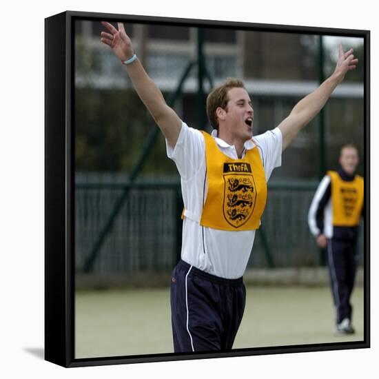 Prince William playing football at the FA Hat-Trick project in Newcastle upon Tyne-null-Framed Stretched Canvas