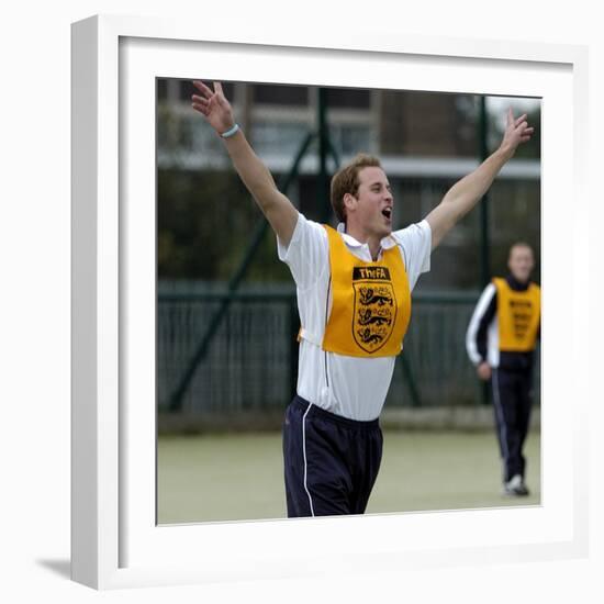 Prince William playing football at the FA Hat-Trick project in Newcastle upon Tyne-null-Framed Photographic Print