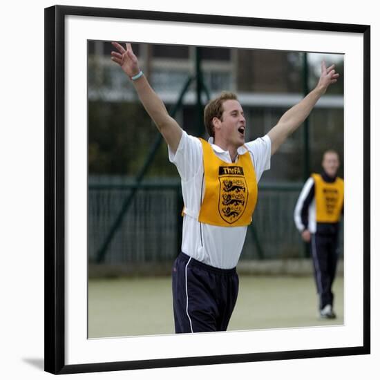 Prince William playing football at the FA Hat-Trick project in Newcastle upon Tyne-null-Framed Photographic Print