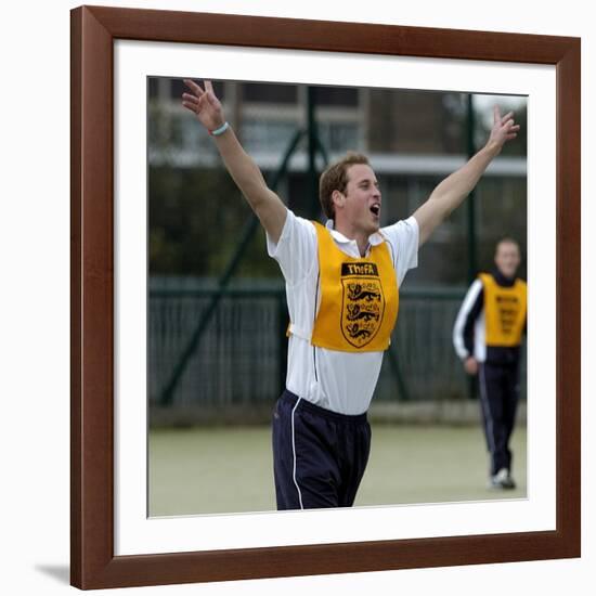 Prince William playing football at the FA Hat-Trick project in Newcastle upon Tyne-null-Framed Photographic Print