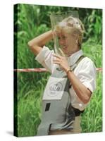 Princess Diana Adjusts Her Face Protector During Her Visit to Mine Fields in Haumbo Angola-null-Stretched Canvas