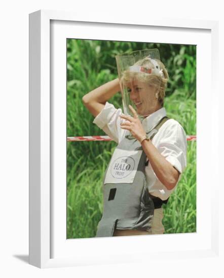 Princess Diana Adjusts Her Face Protector During Her Visit to Mine Fields in Haumbo Angola-null-Framed Photographic Print