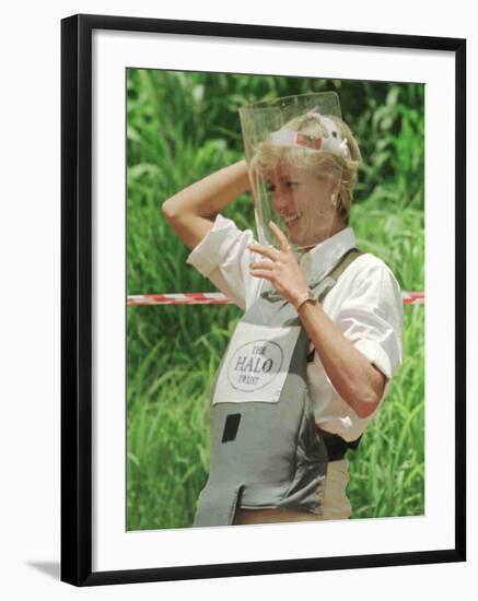 Princess Diana Adjusts Her Face Protector During Her Visit to Mine Fields in Haumbo Angola-null-Framed Photographic Print