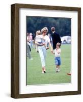 Princess of Wales with Prince Harry and Prince William at a polo match at Windsor-null-Framed Photographic Print