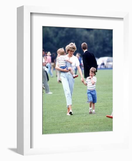 Princess of Wales with Prince Harry and Prince William at a polo match at Windsor-null-Framed Photographic Print