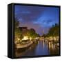 Prinsengracht canal and Westerkerk at dusk, Amsterdam, Netherlands-Ian Trower-Framed Stretched Canvas