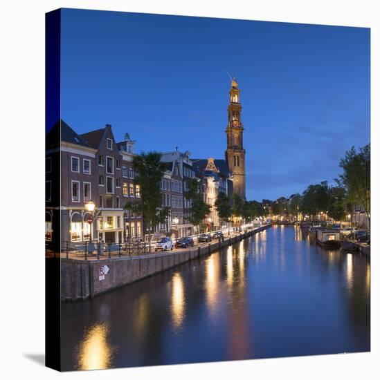 Prinsengracht canal and Westerkerk at dusk, Amsterdam, Netherlands-Ian Trower-Stretched Canvas