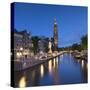 Prinsengracht canal and Westerkerk at dusk, Amsterdam, Netherlands-Ian Trower-Stretched Canvas